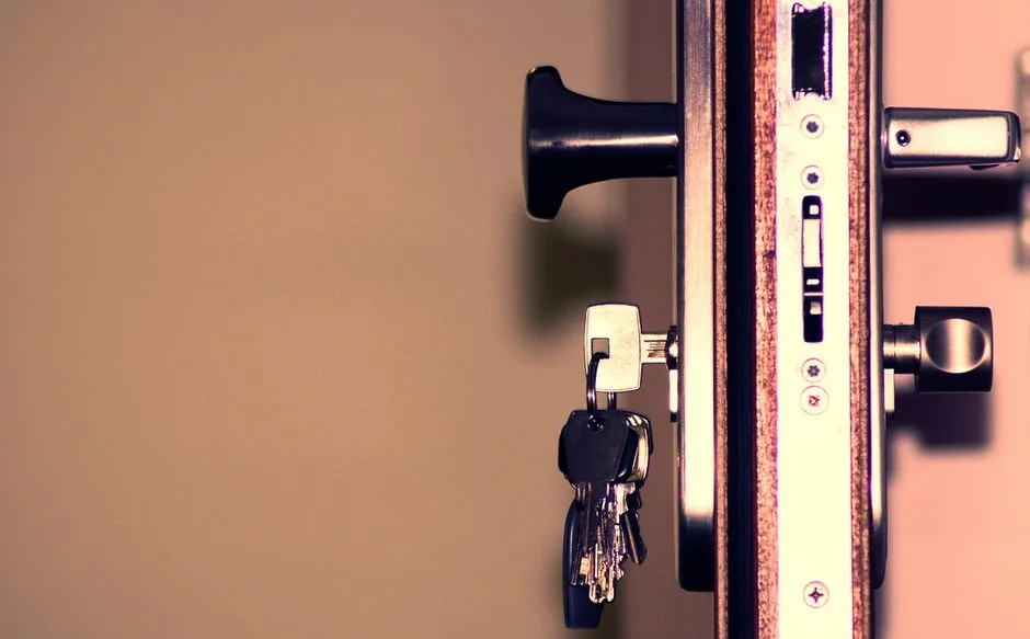 Locksmith working on a door